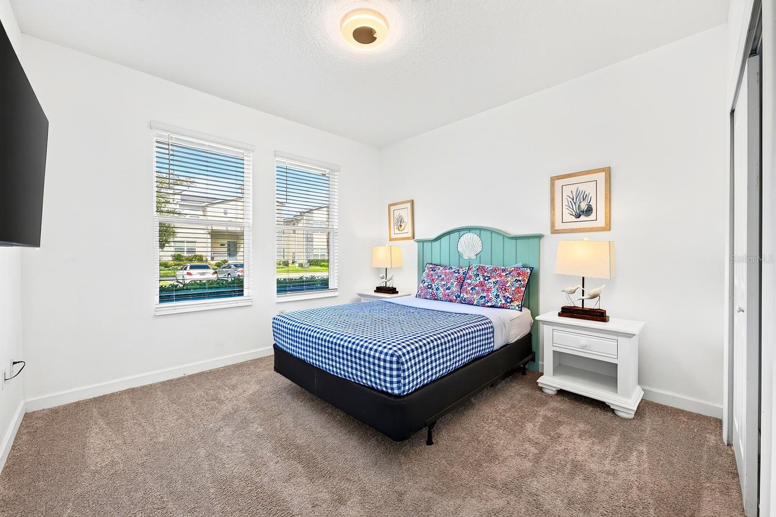 The main floor also offers a BEDROOM and FULL BATH, providing an ideal option for guests, extended family or MULTIGENERATIONAL LIVING.