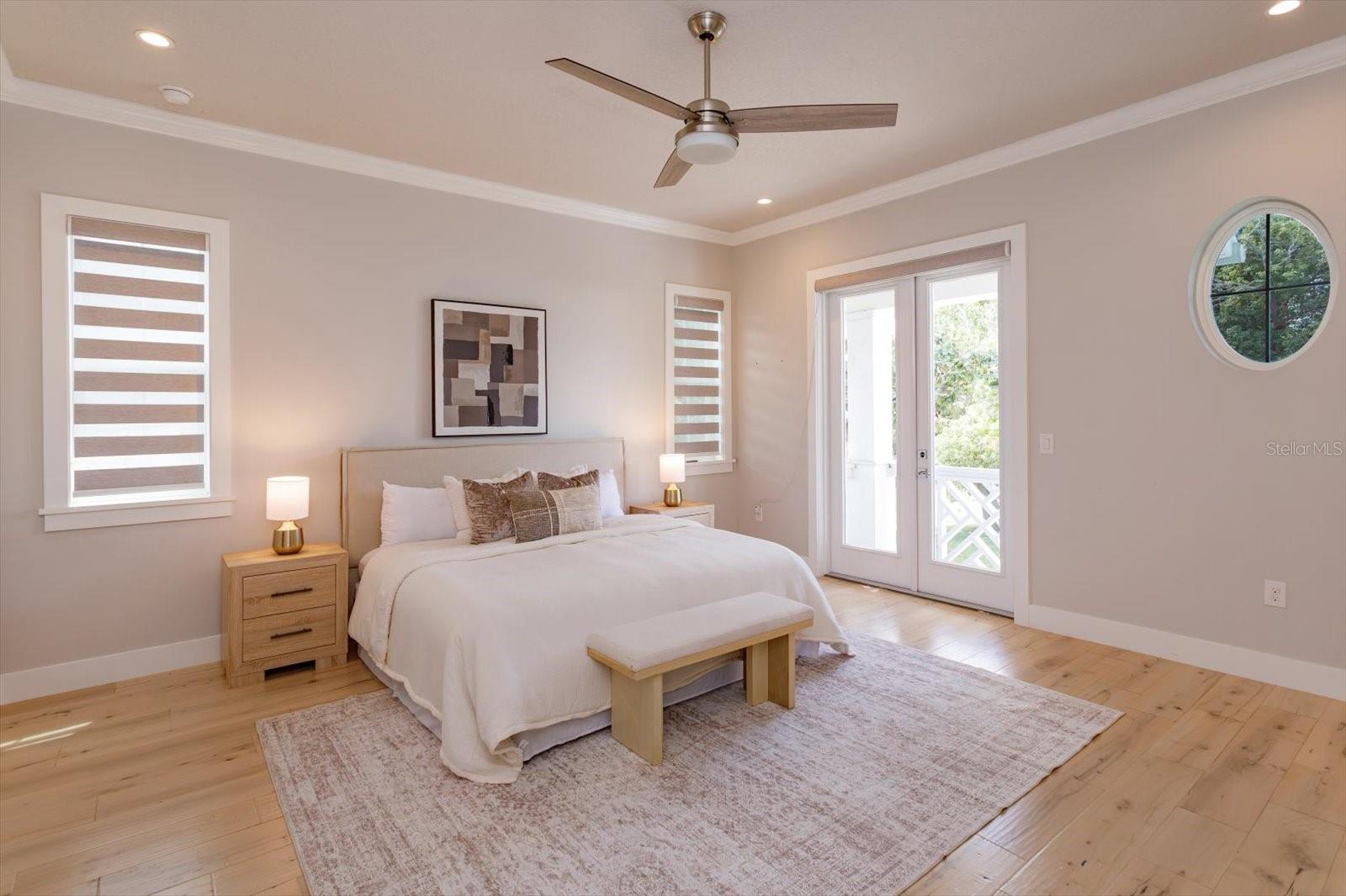 Second floor primary suite with balcony