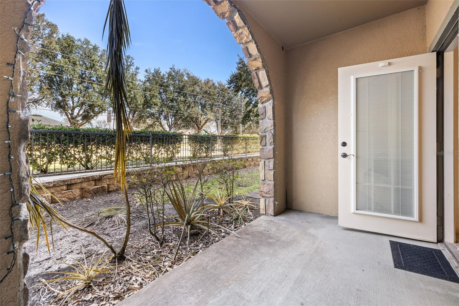 Private covered rear patio off the main living space