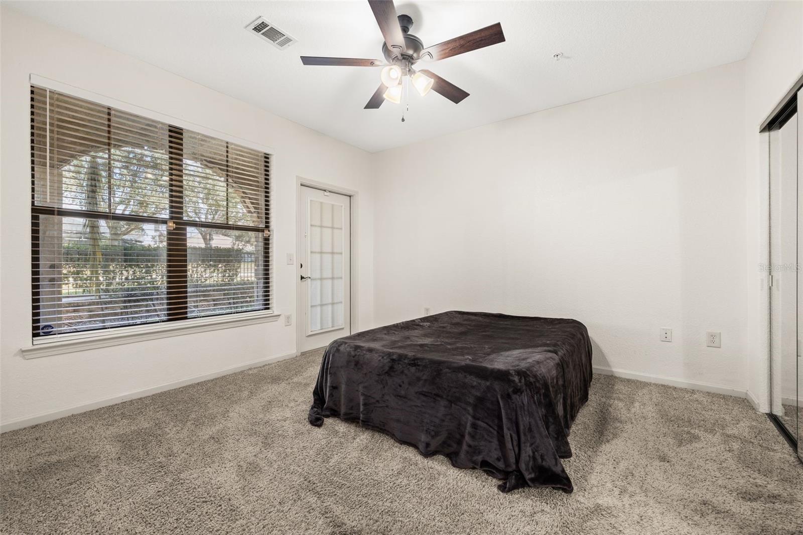 Window and private access to the rear patio