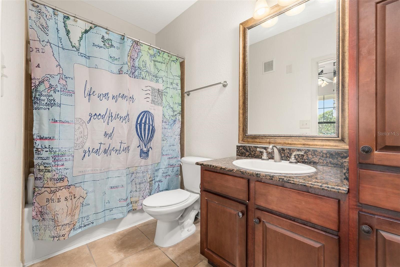 Bedroom 2's private bathroom with a shower/bathtub combination