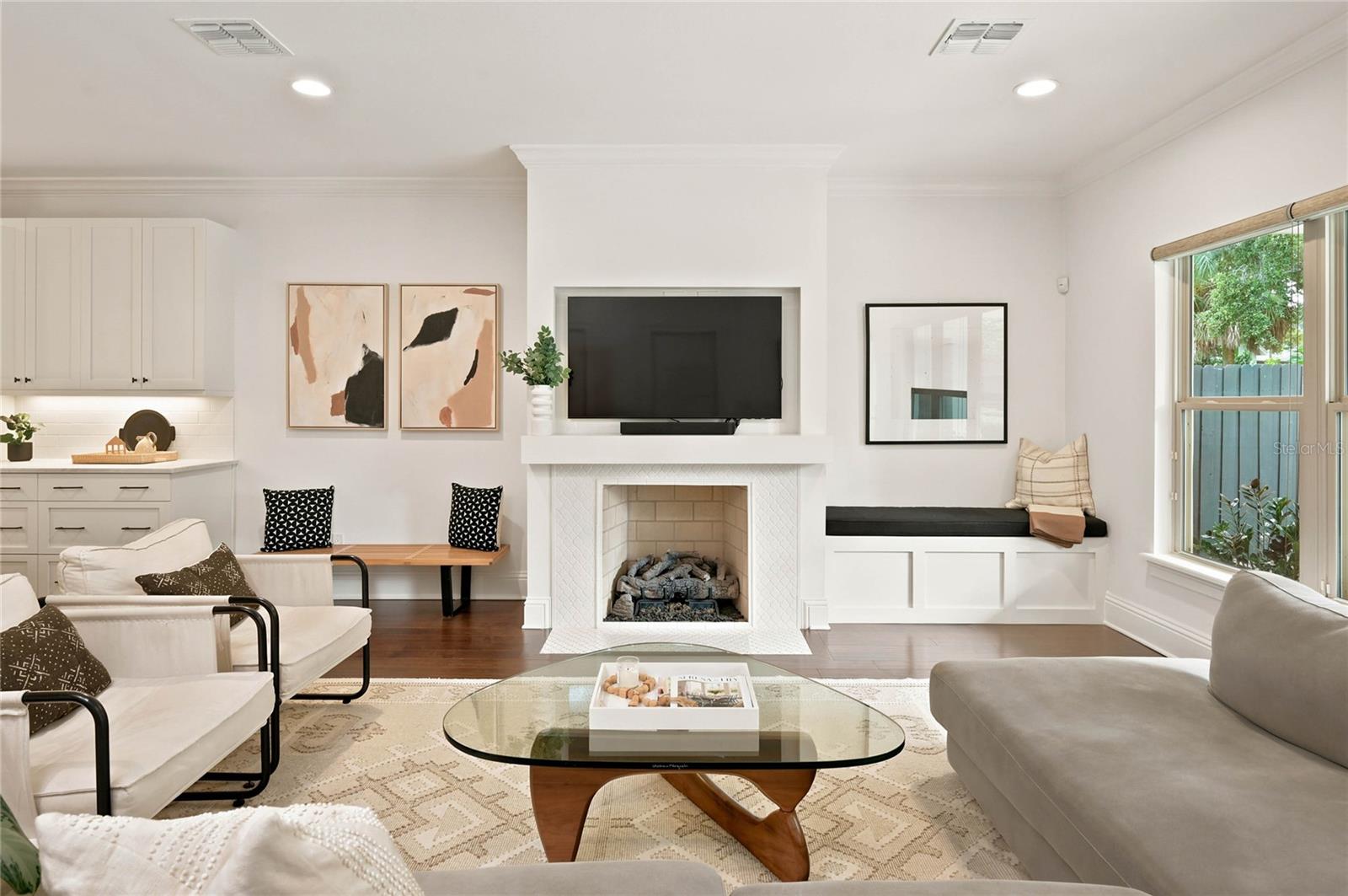 Gas fireplace & built in bench seating make for cozy evenings