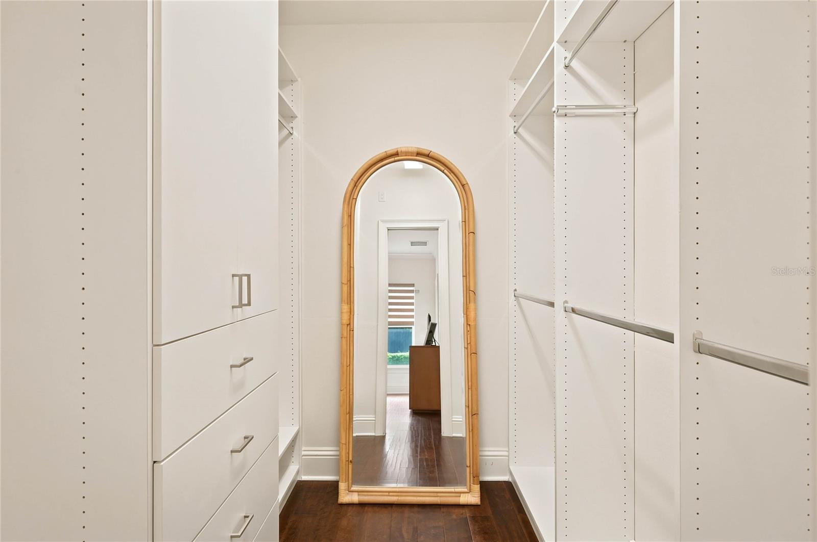 One of two walk-in customized closets in Owners suite