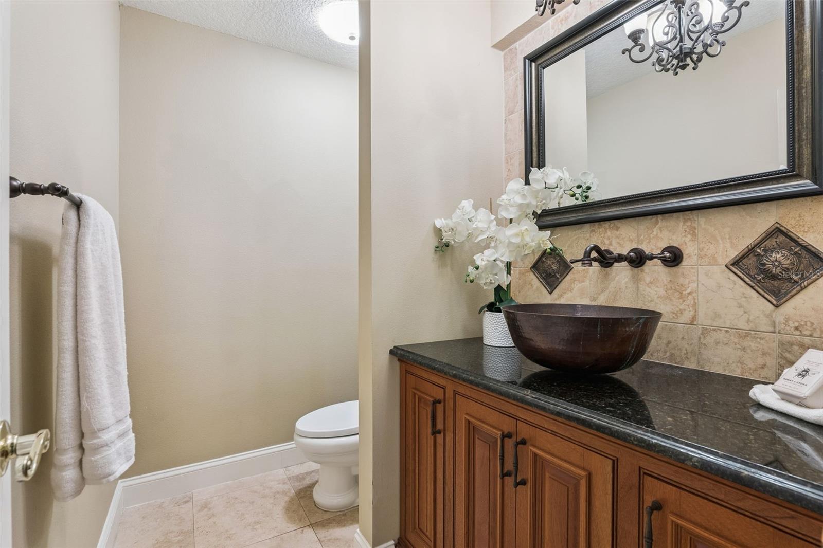 Guest Half Bath in hallway off kitchen