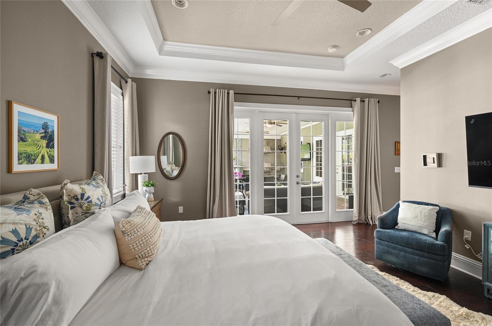 The room is sizable enough for bedroom furniture and even a pair of chairs.