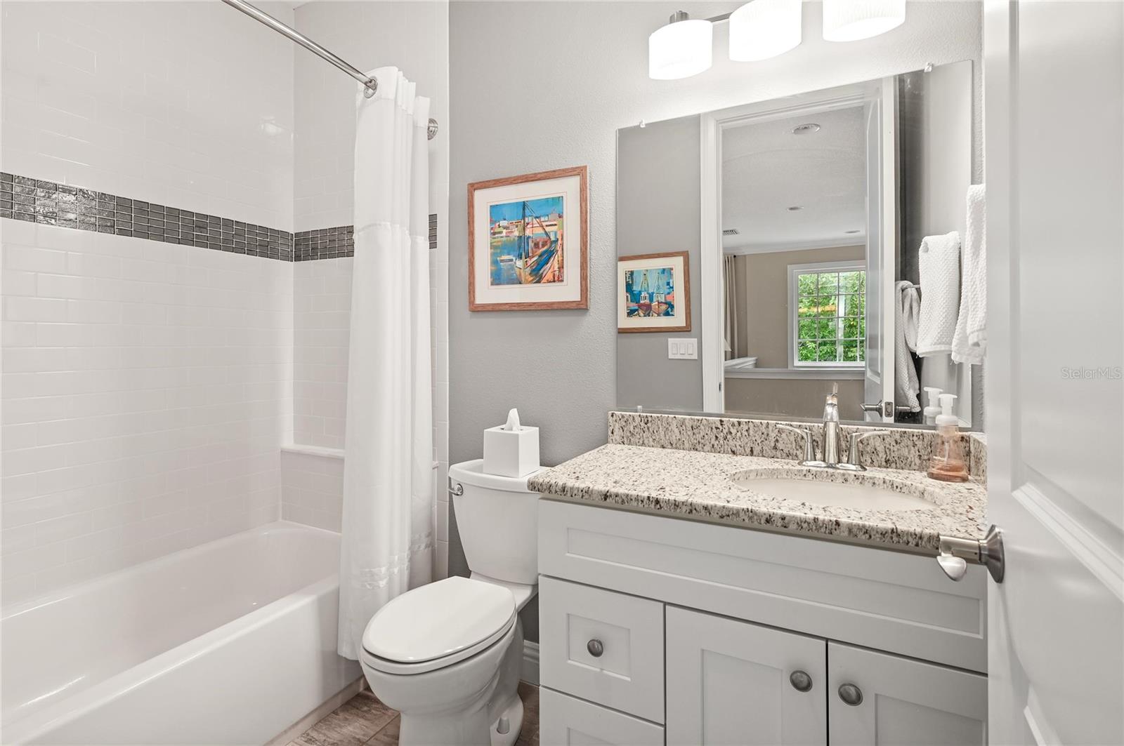 This full bath is adjacent to the loft and convenient to the third upstairs bedroom.