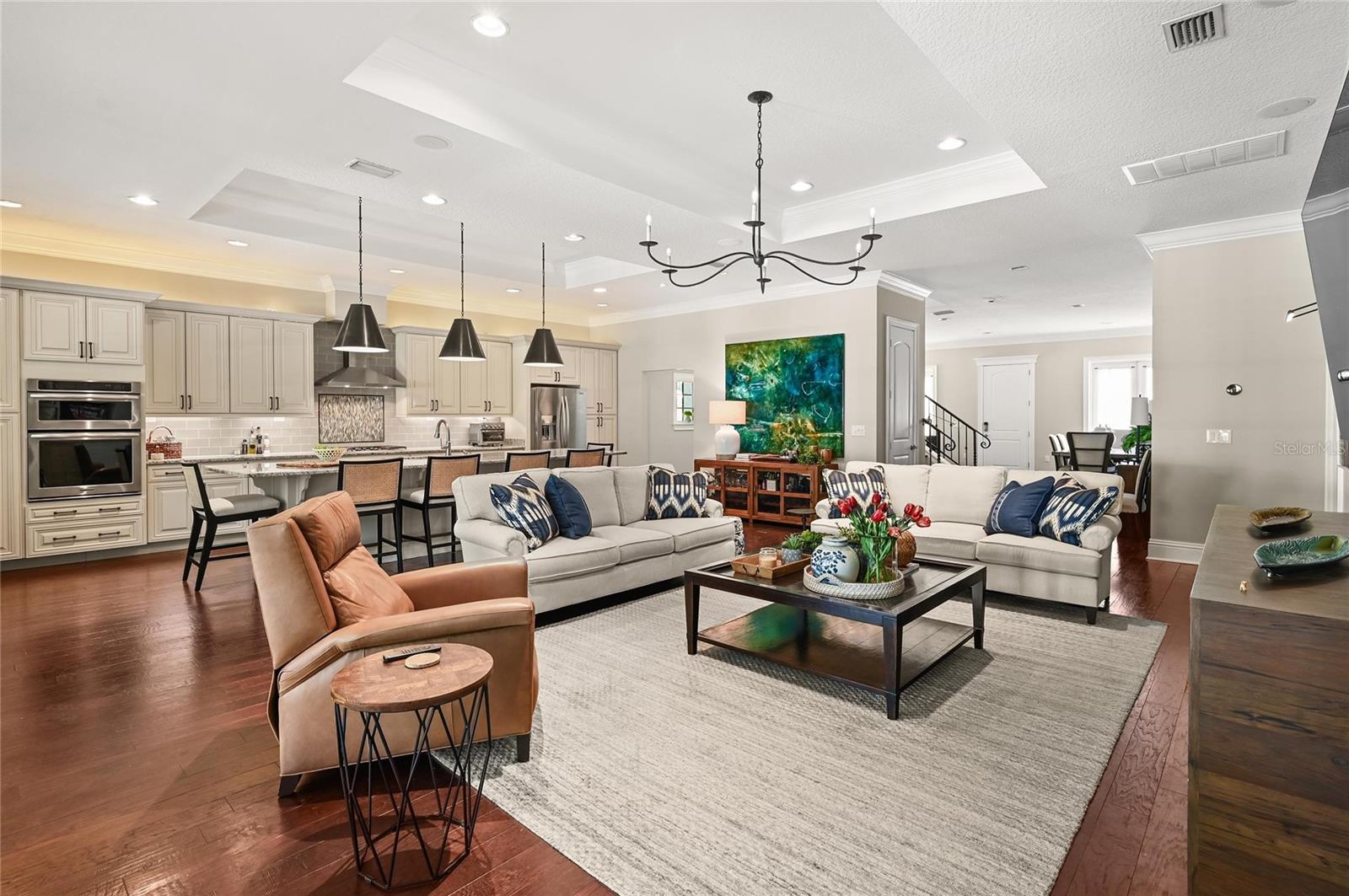10-foot ceilings are accentuated by tray ceilings and feature recessed lighting, art lighting, and high-end decorative lighting.