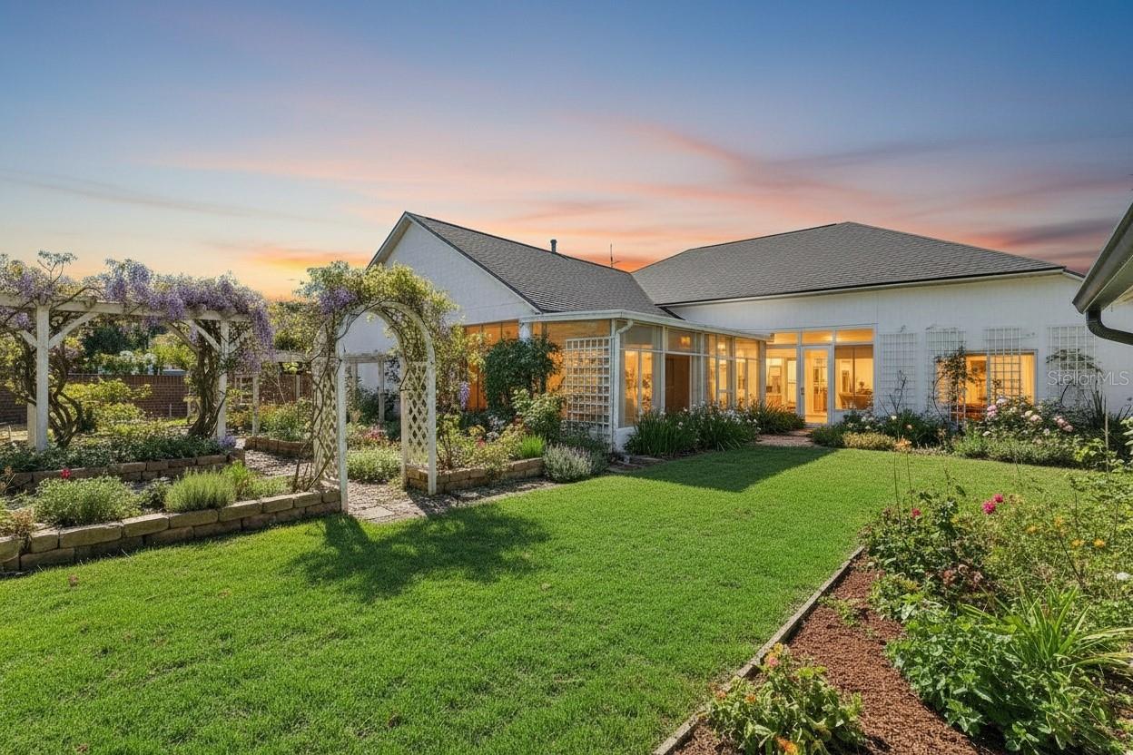 Virtually Changed to show backayrd potential with existing flower beds and added landscaping. Virtually Changed to show backayrd potential with existing flower beds and added landscaping.