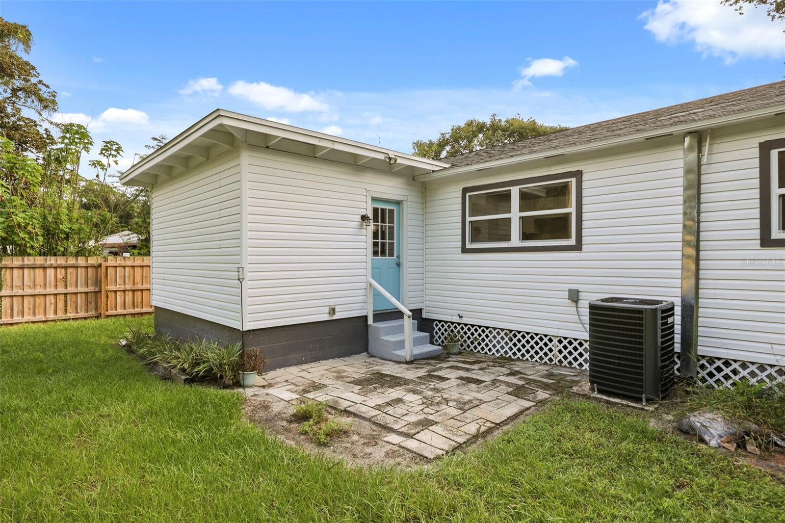 Rear door leading to backyard
