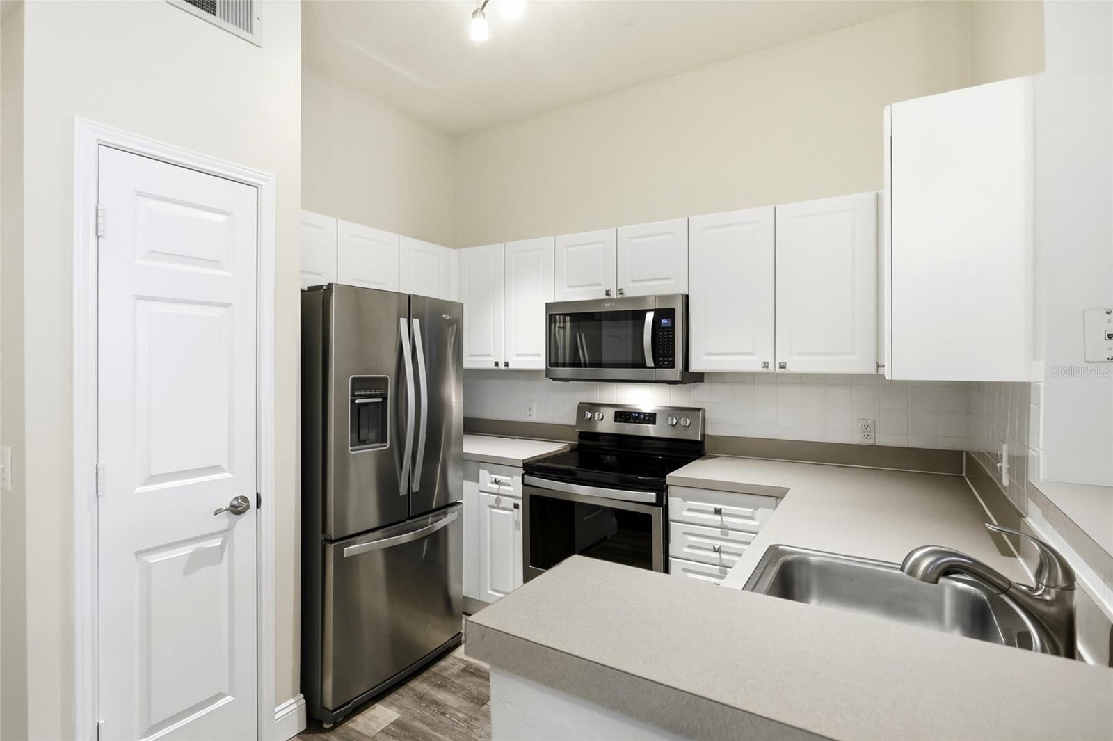 Stainless steel appliances in kitchen