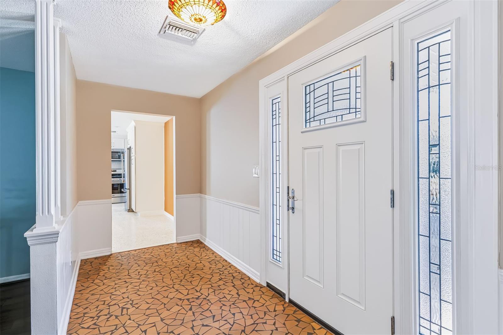 Welcoming Entry with Chair Rail Molding