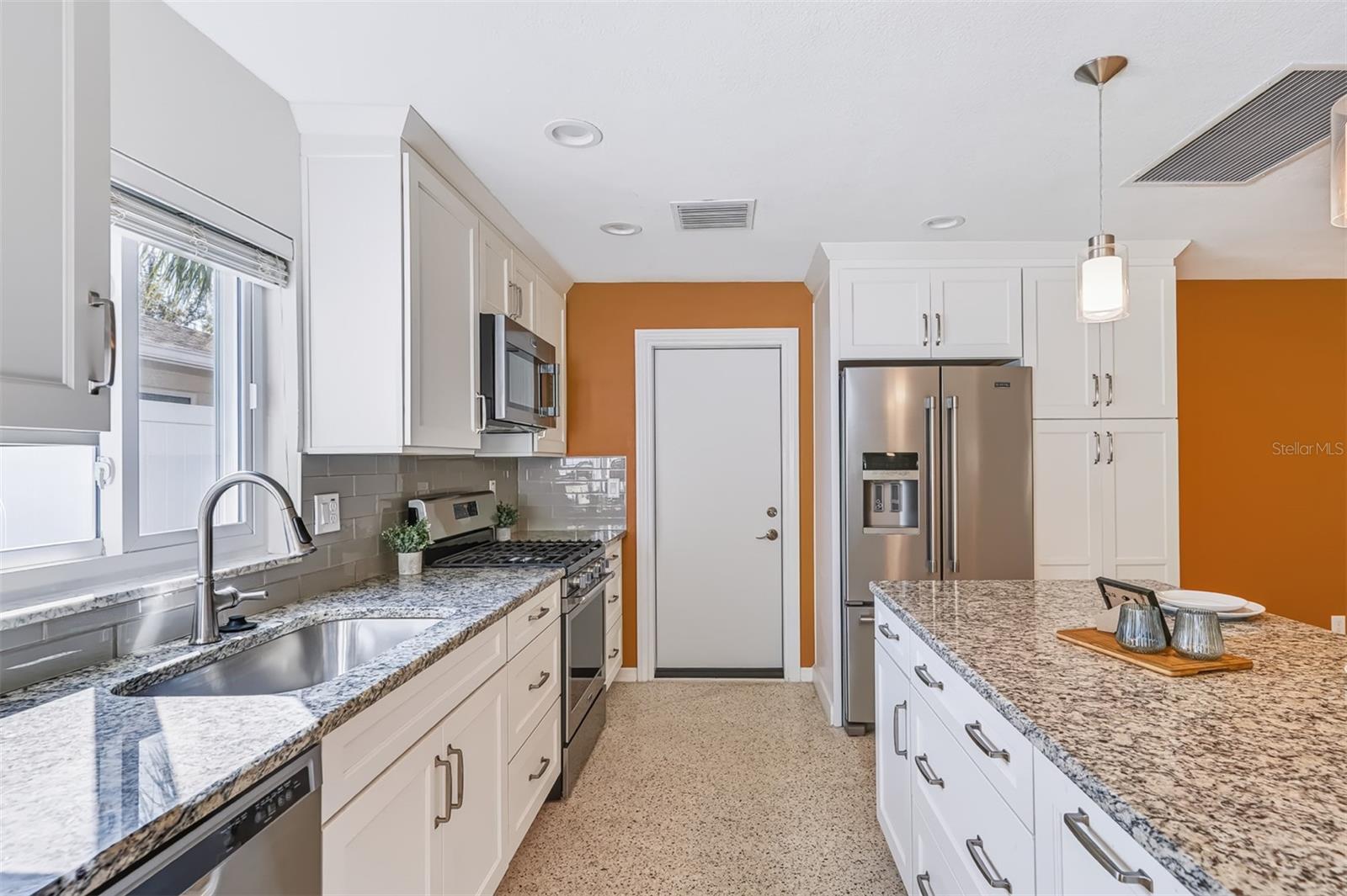 Kitchen with New Gas Range and Island with Storage & Power