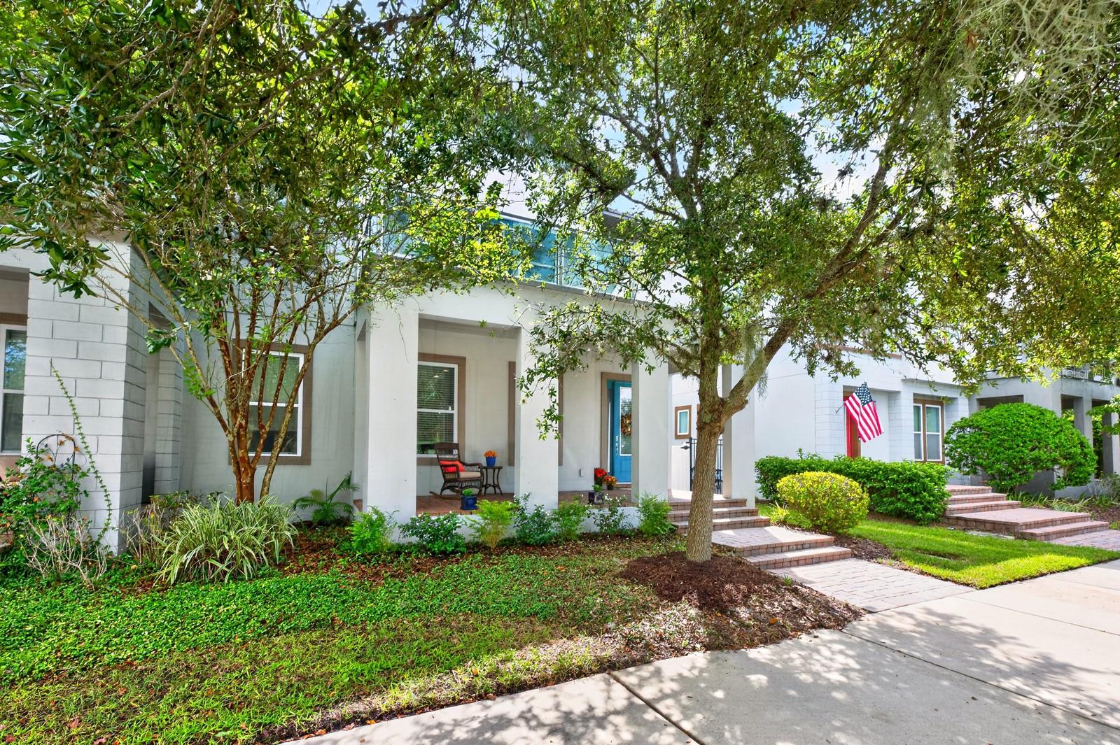 Welcome to the tree-lined streets of Laurate Park in Lake Nona!