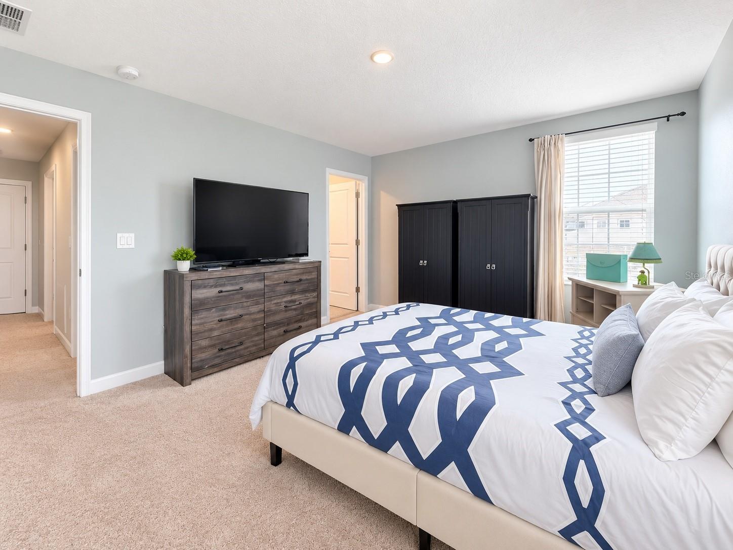 Walk in closets add ample storage space.