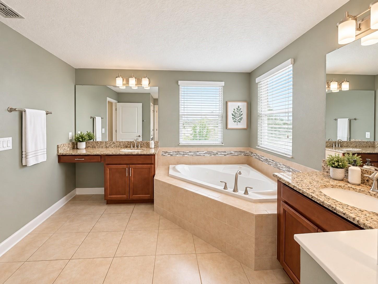 Private primary bath offering a spacious layout designed for everyday comfort.