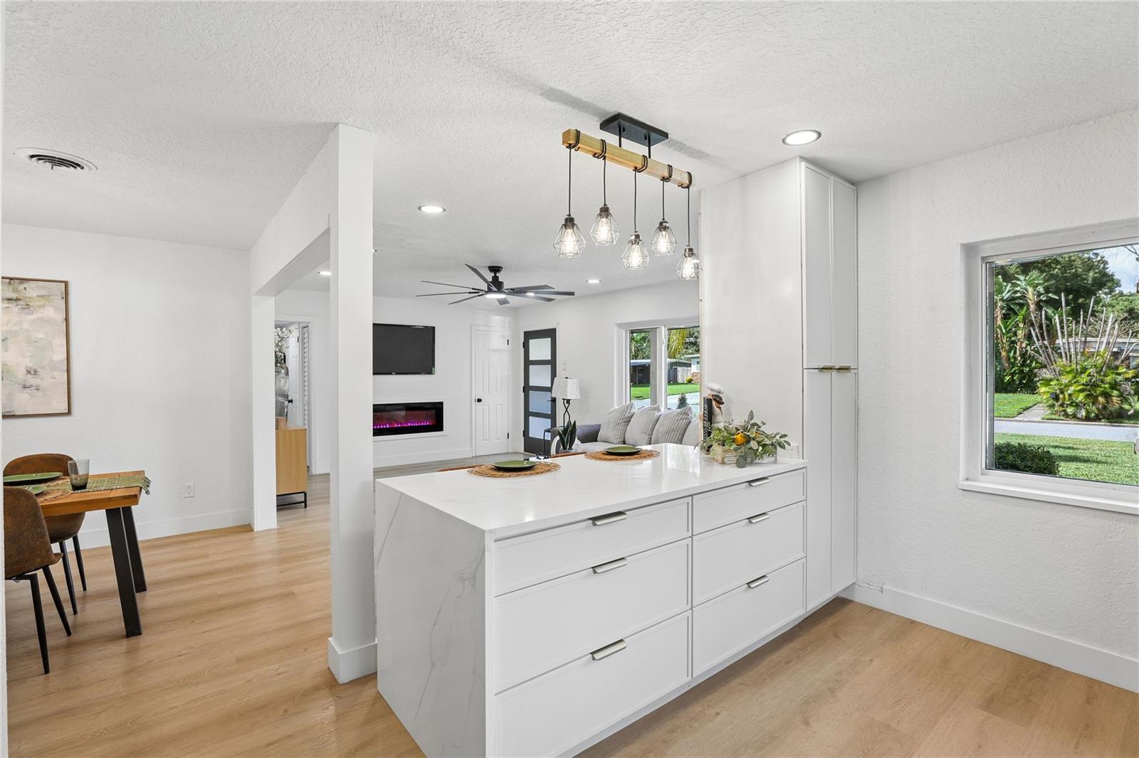 The heart of the home  redesigned kitchen with waterfall-edge island