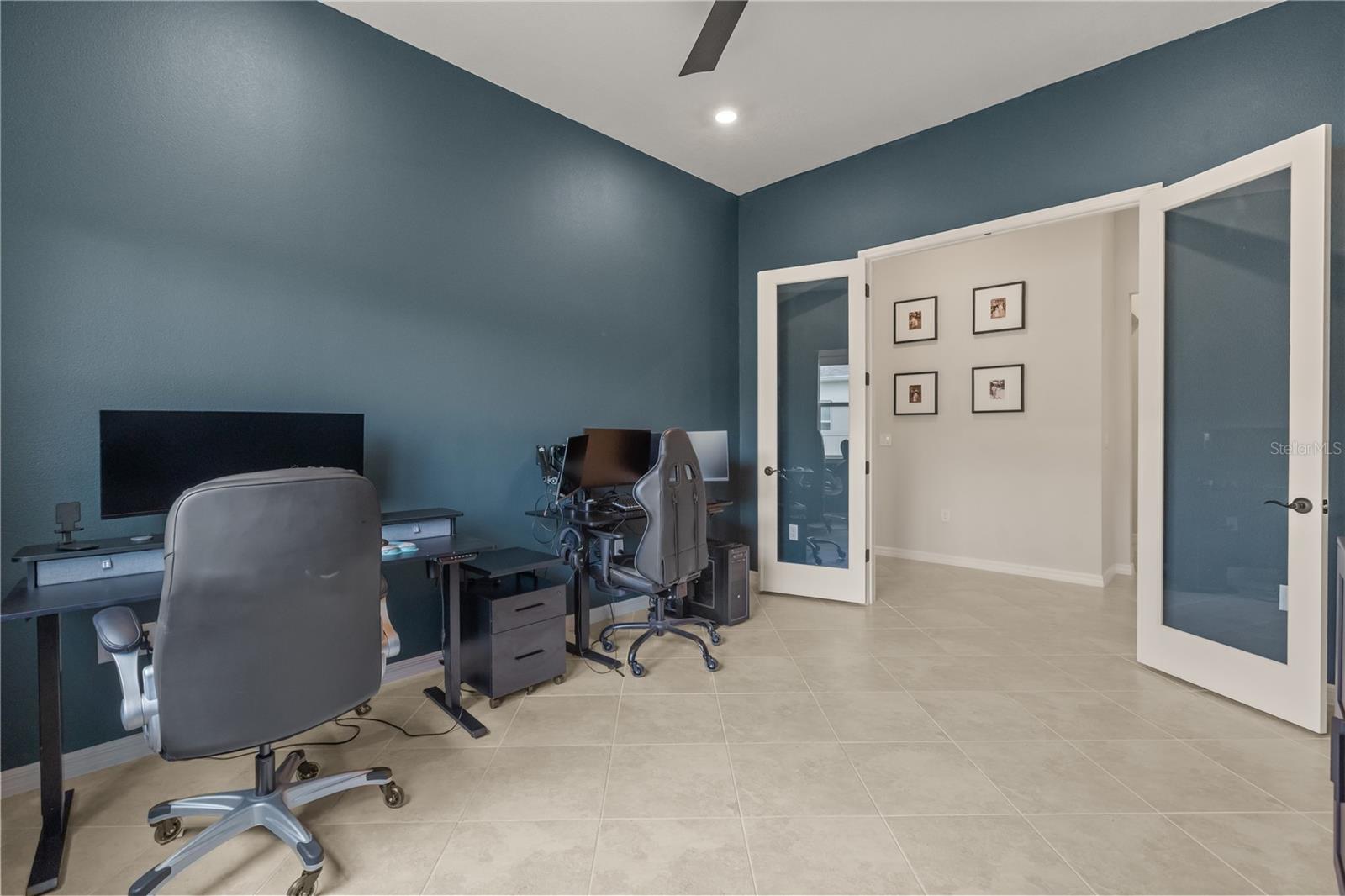 Bonus room/ flex space with French doors and oversized window