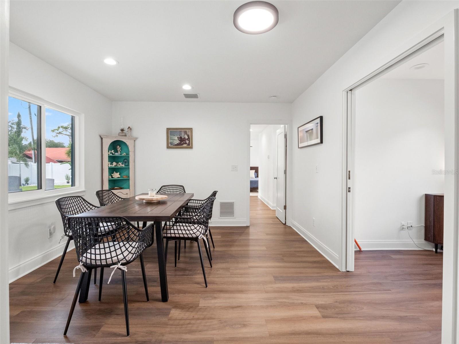 Addition with dining area, door to patio/pool, office Addition with dining area, door to patio/pool, office