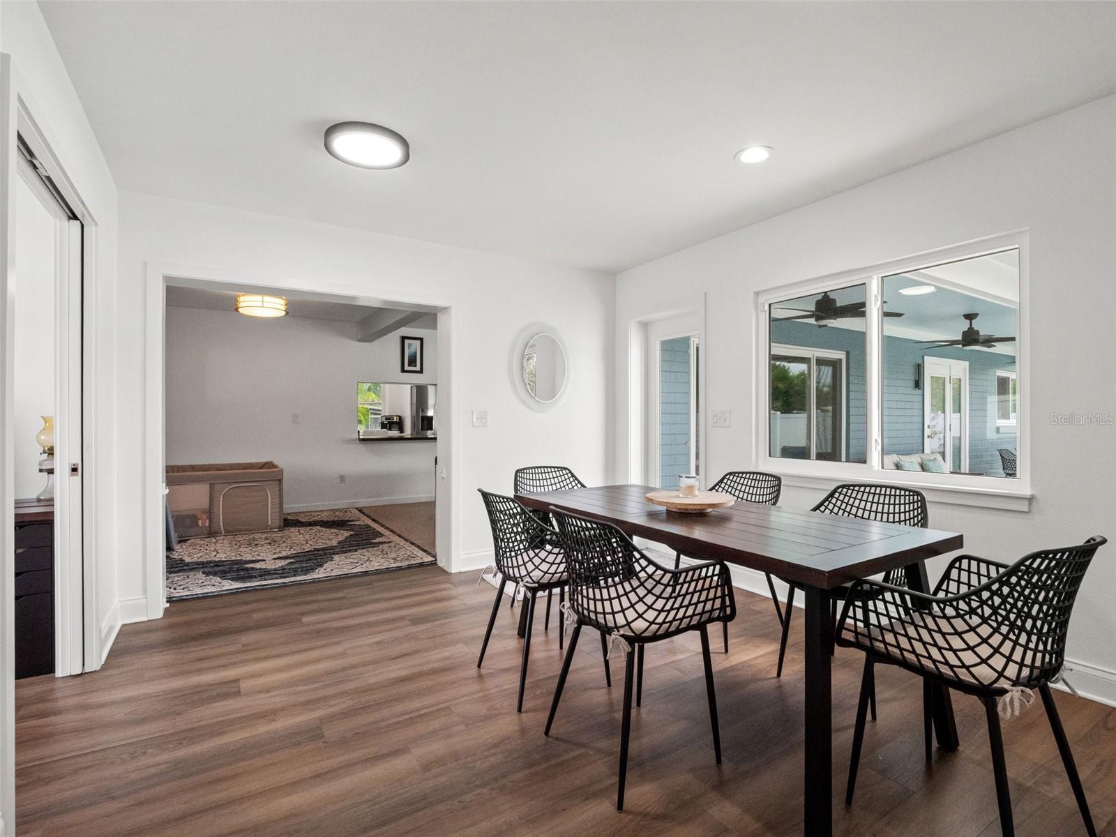 Addition with dining area, door to patio/pool, office Addition with dining area, door to patio/pool, office