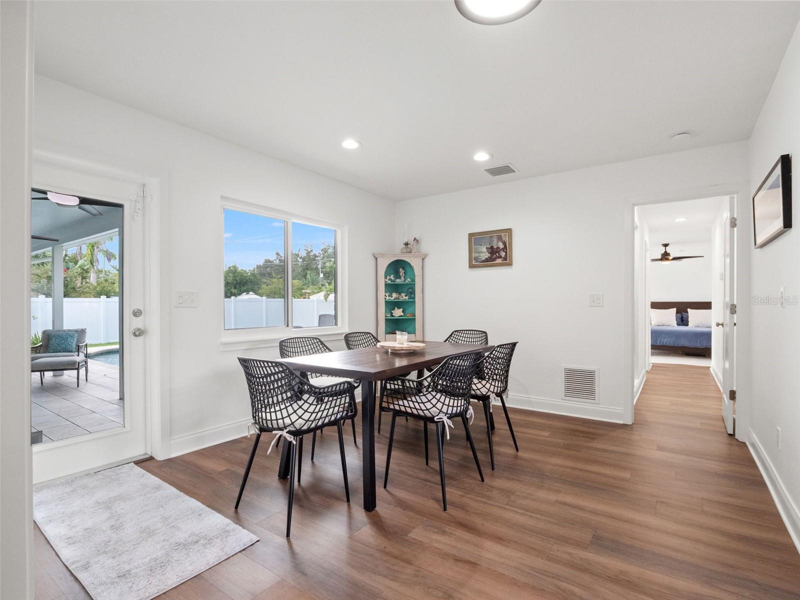 Addition with dining area, door to patio/pool, office Addition with dining area, door to patio/pool, office
