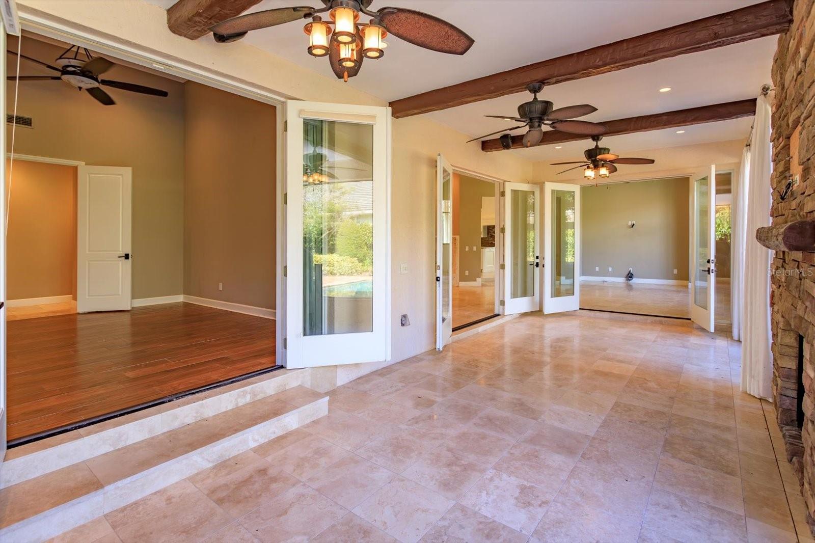 All French doors open to Beautiful Patio & Pool