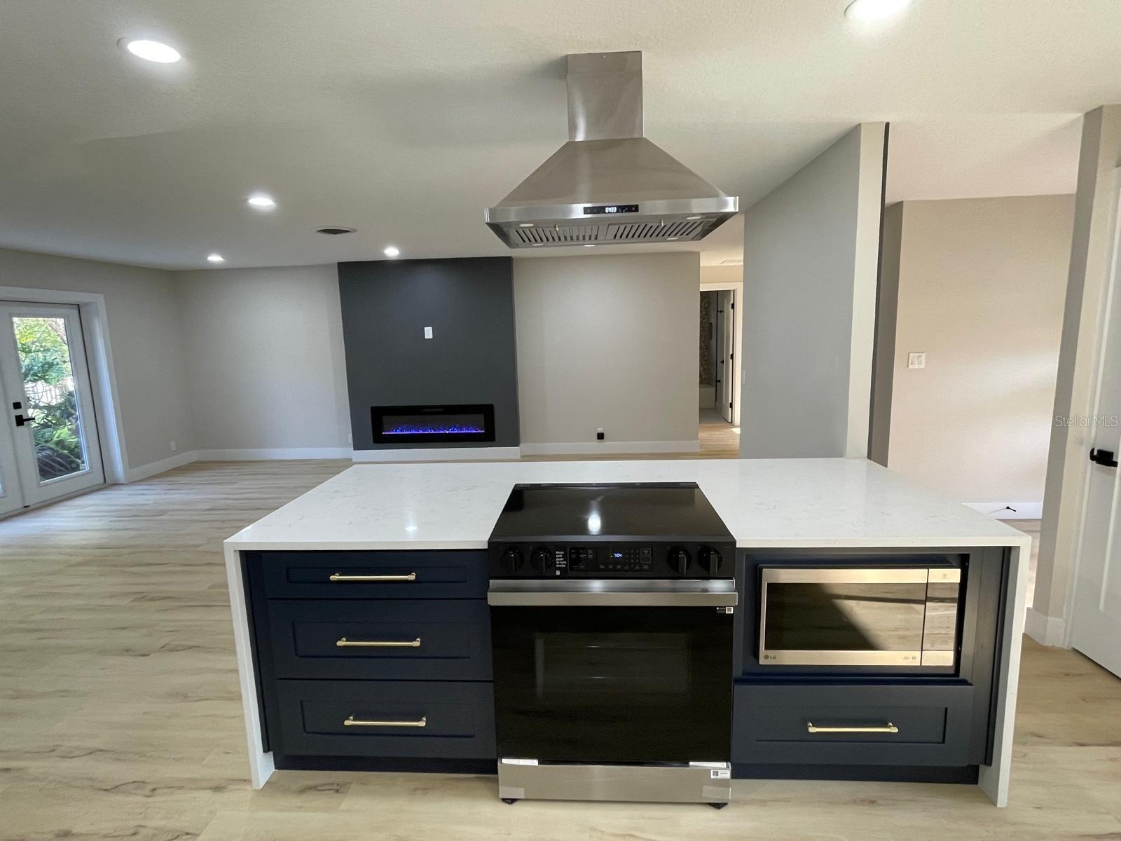 Kitchen to Living Room/Fireplace Unfurnished