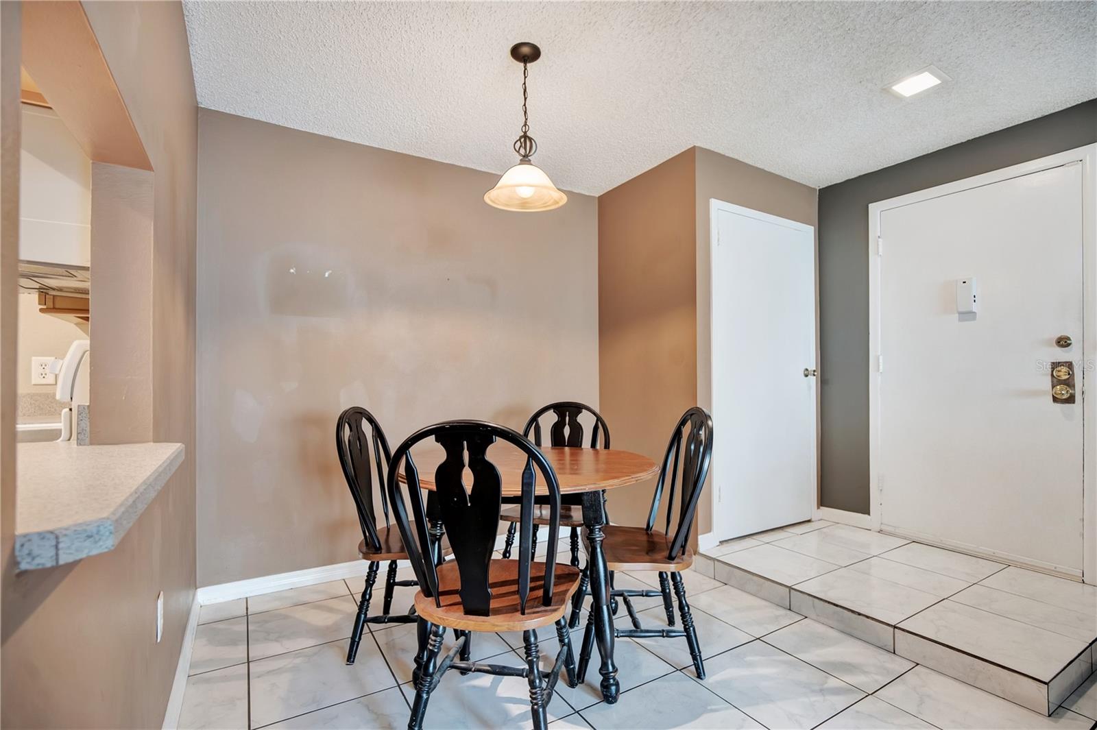 Dining Area/Entry Staged Dining Area/Entry Staged