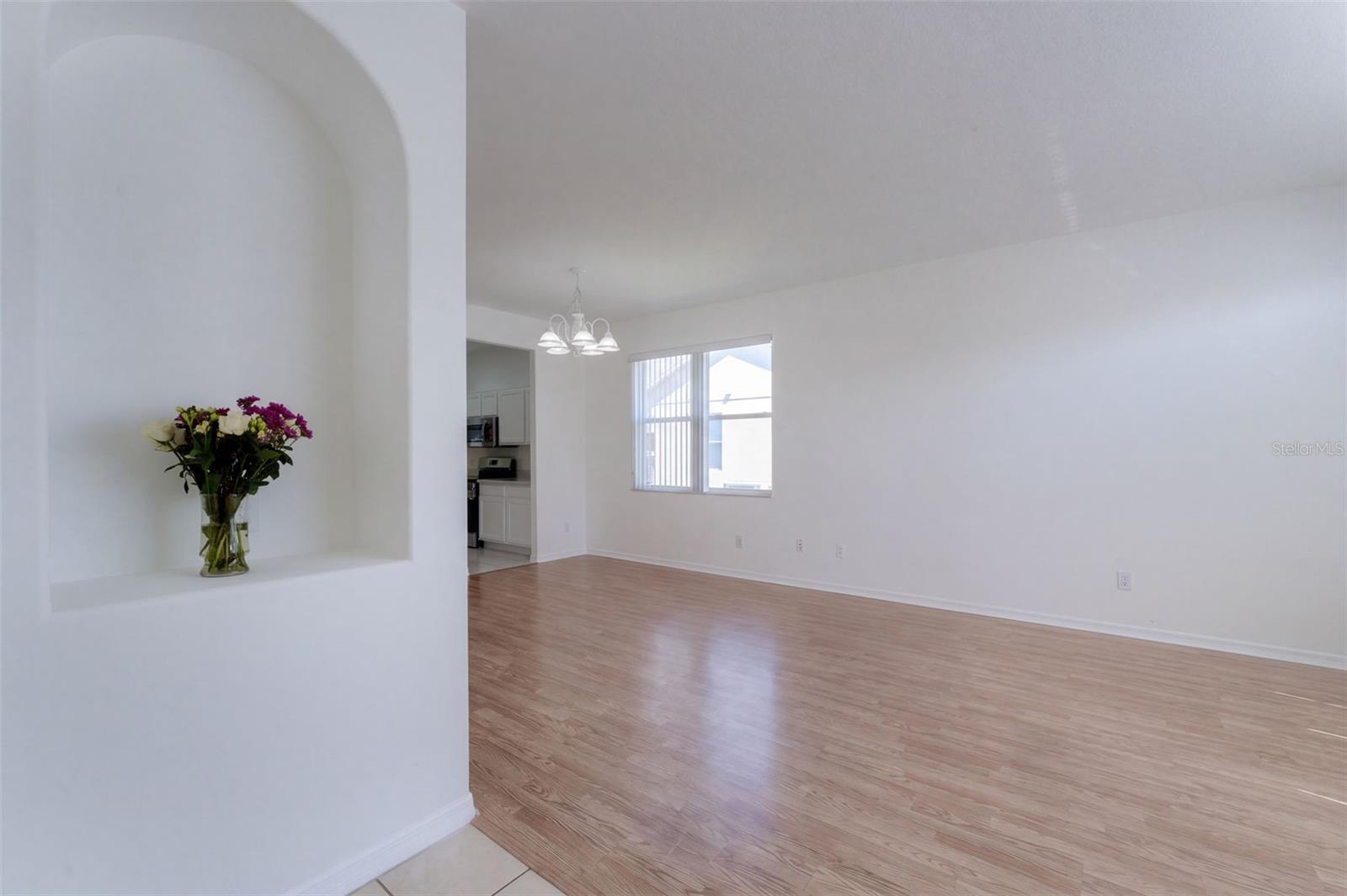 From front door, looking into living room/dining room