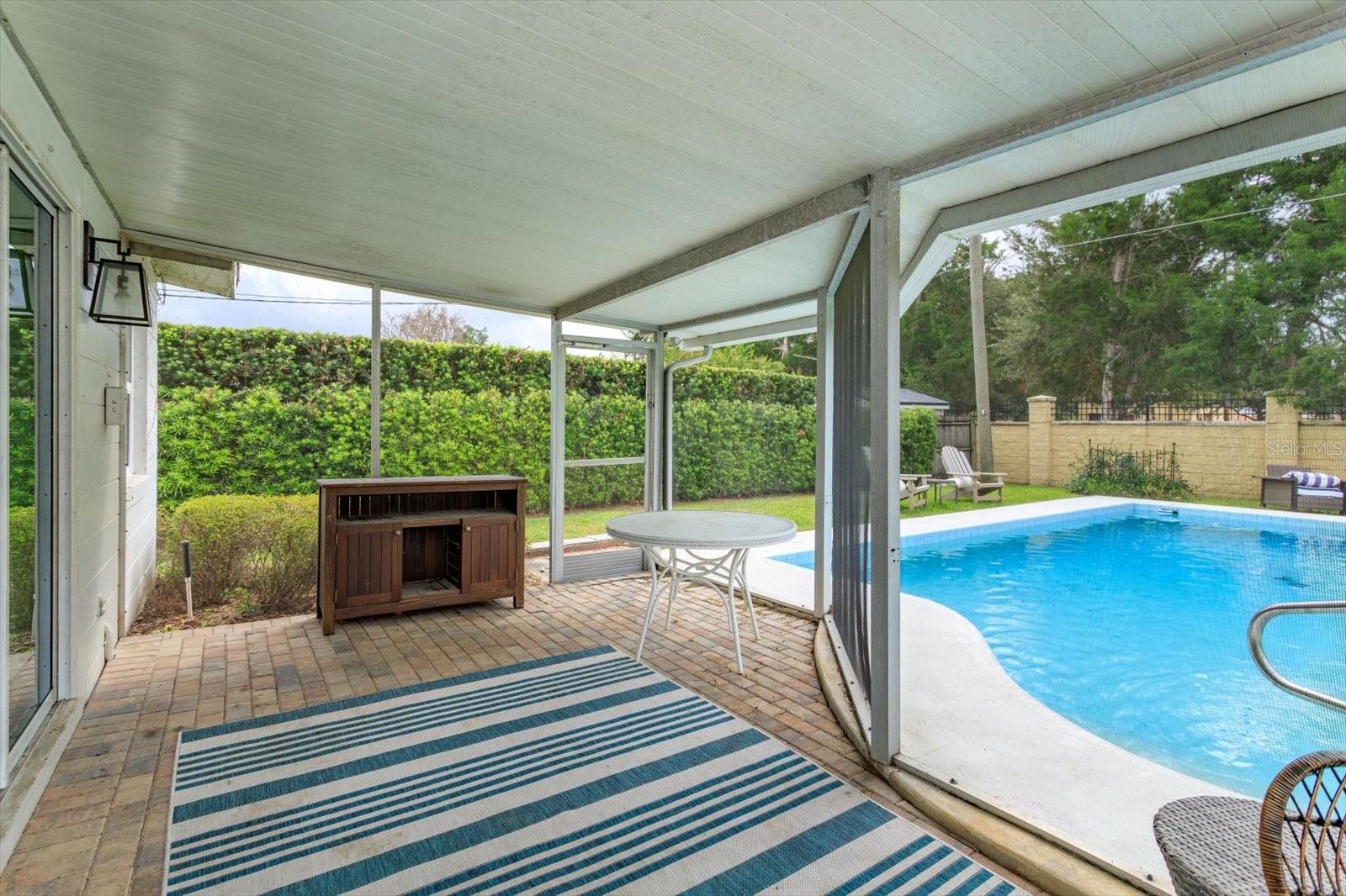 Screened in lanai with brick pavers