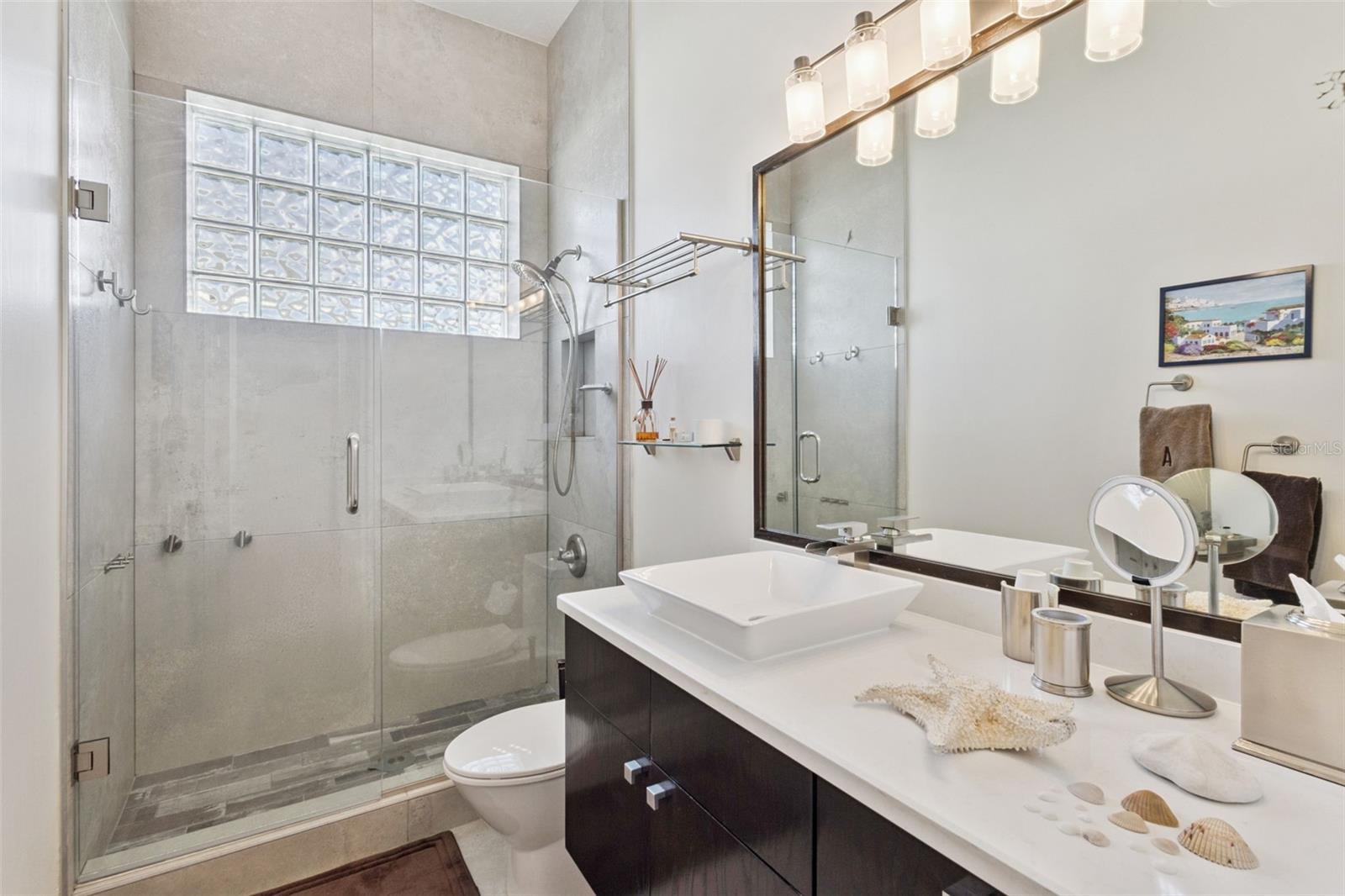 Full Bath between Bedroom 3 and 4.