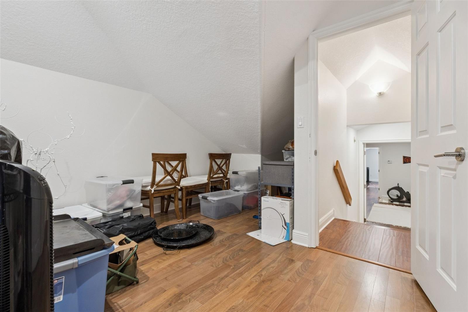 Upstairs room - could be used as storage or small office.