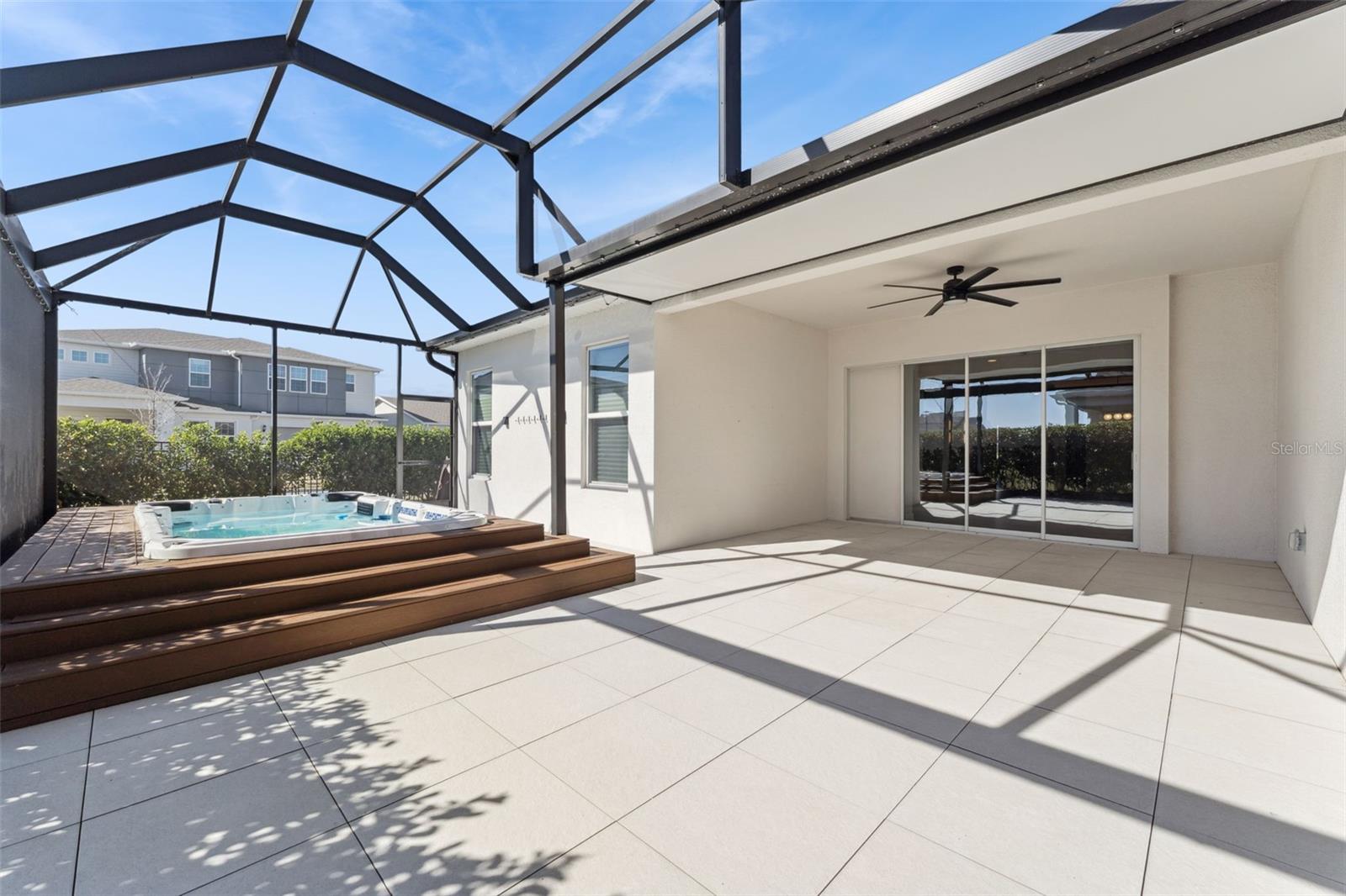 Expansive screened lanai offering plenty of outdoor living space.