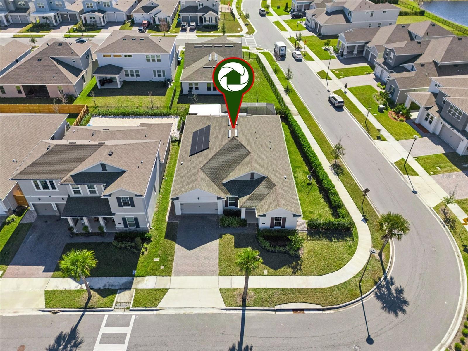 Aerial neighborhood view highlighting the homes location within the community.