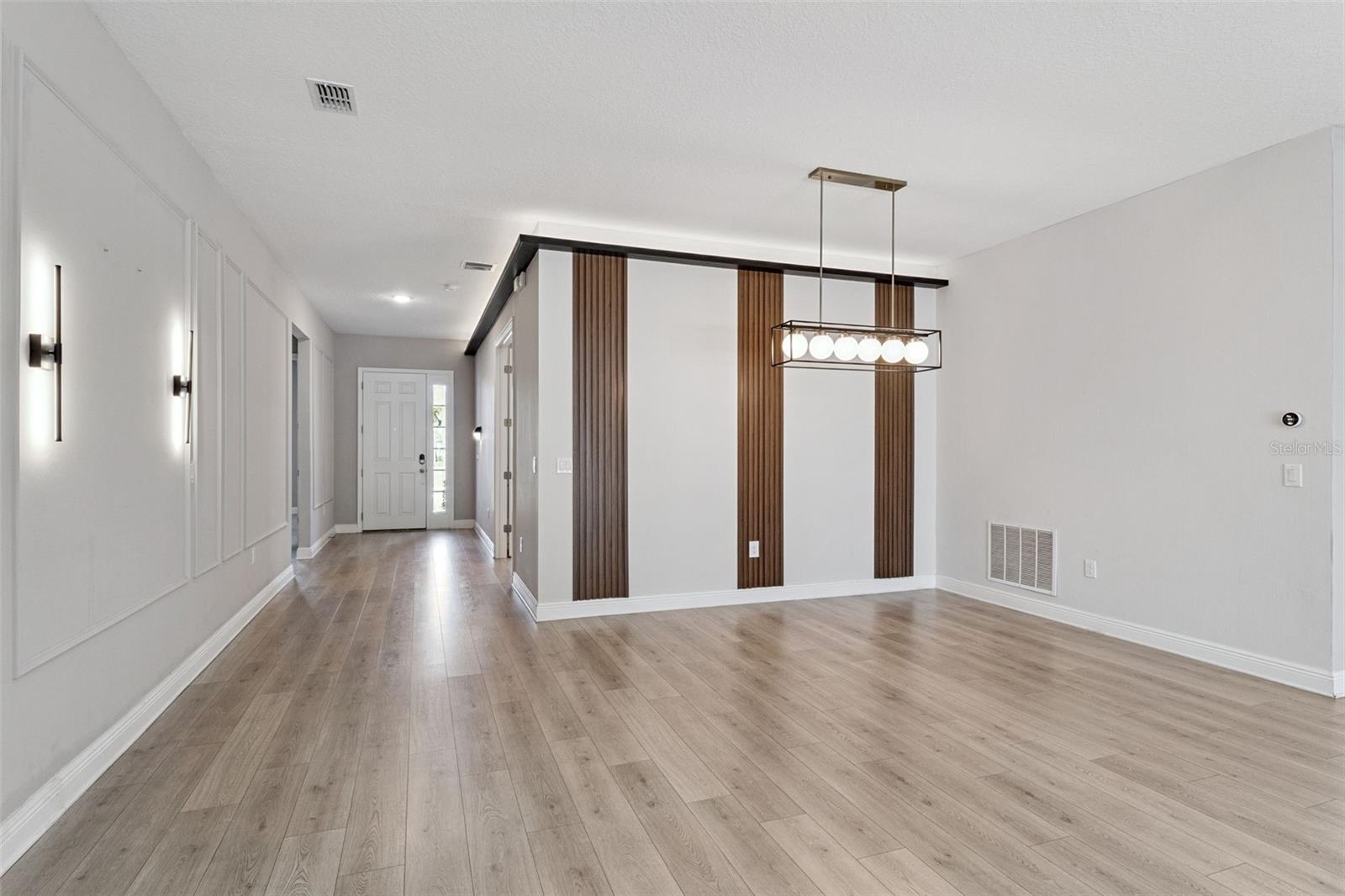 Spacious dining area with an open layout and modern finishes. Spacious dining area with an open layout and modern finishes.
