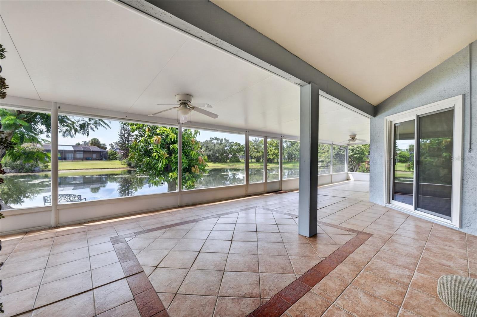 The large back patio offers more than 700 square feet of lakefront entertaining and relaxation space!