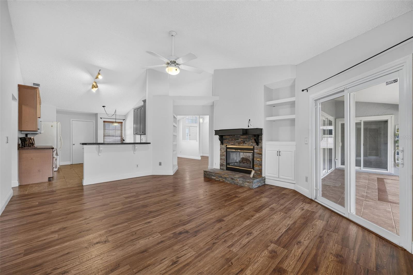 The large family room opens to the eat-in kithcen.