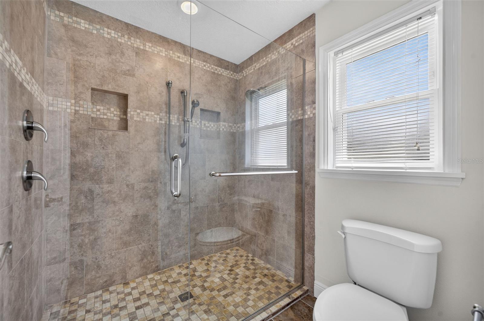 The primary retreat also features a walk-in shower.