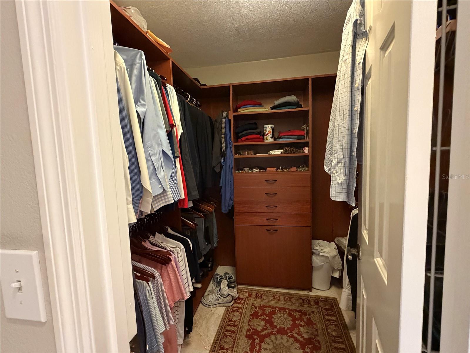 Walk in closet with organizers