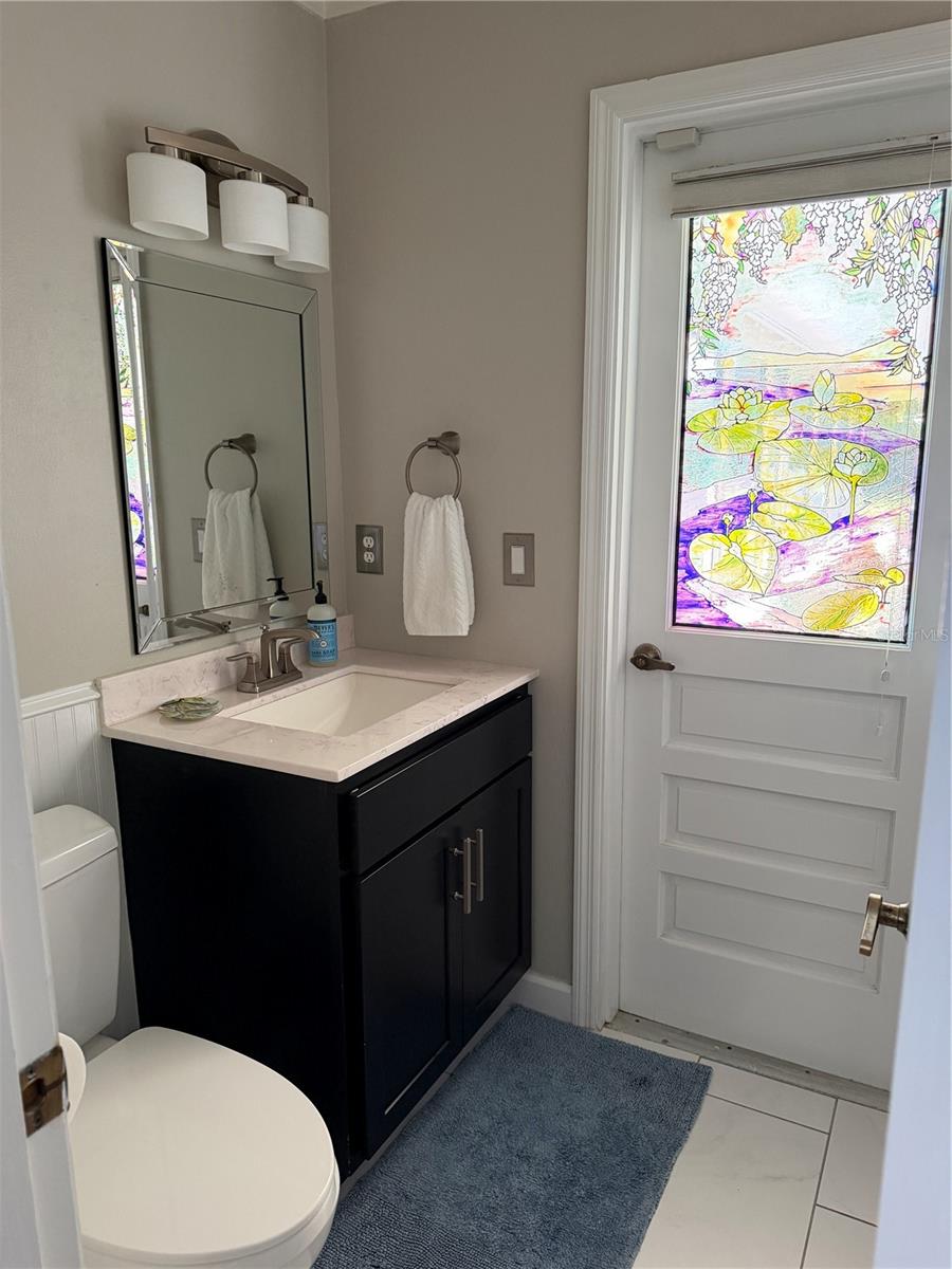 Ensuite bath with door to outside
