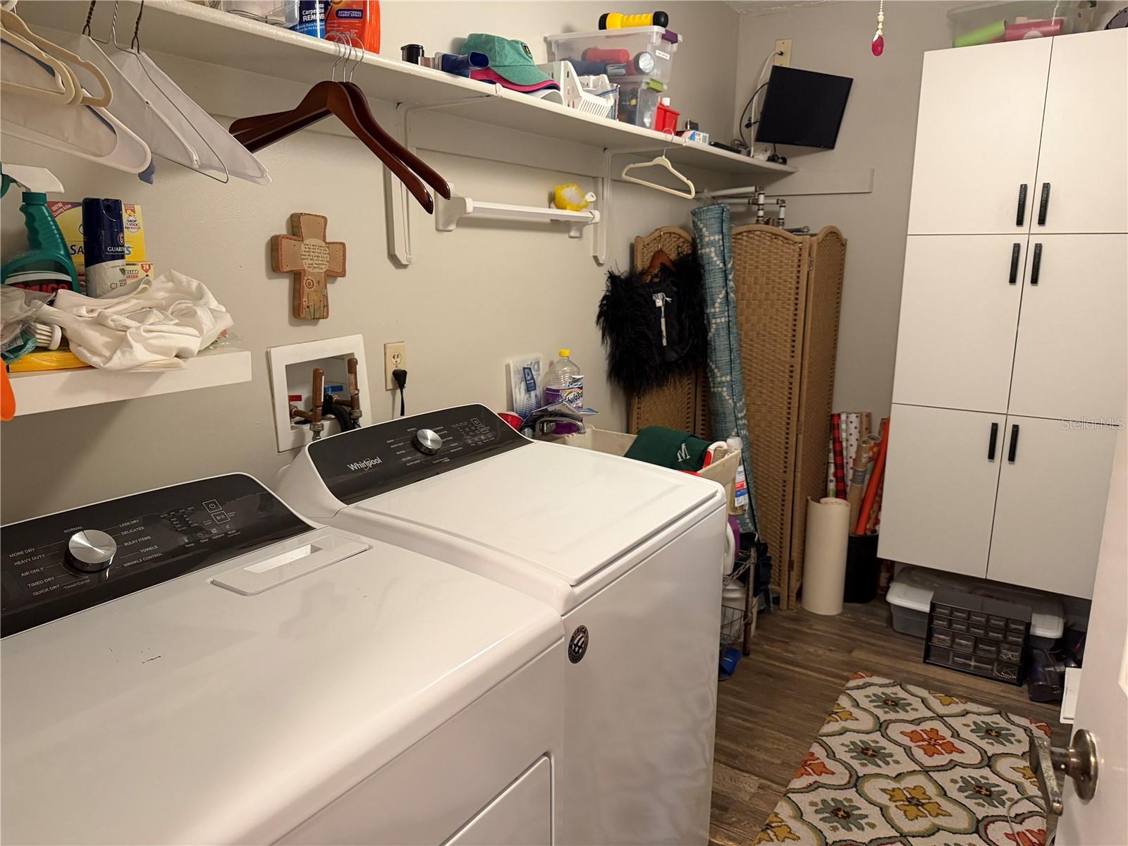 Inside launfry room with utility sink