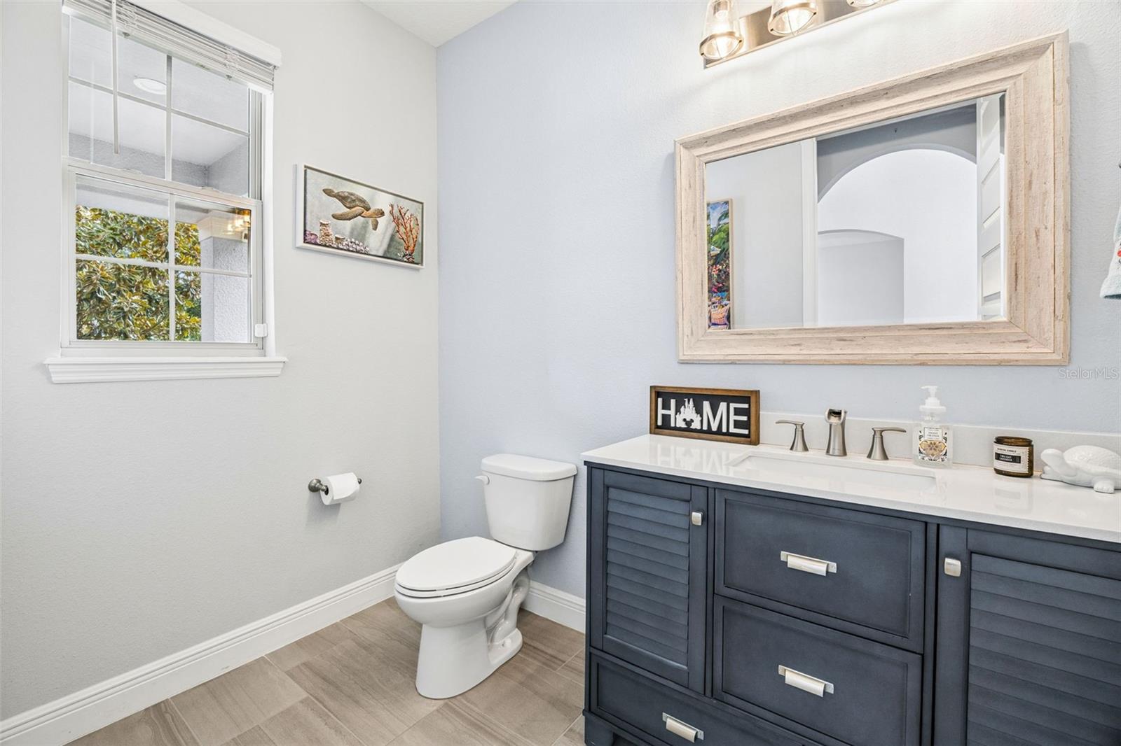 Remodeled Powder Bath with Upgraded Cabinet & Mirror