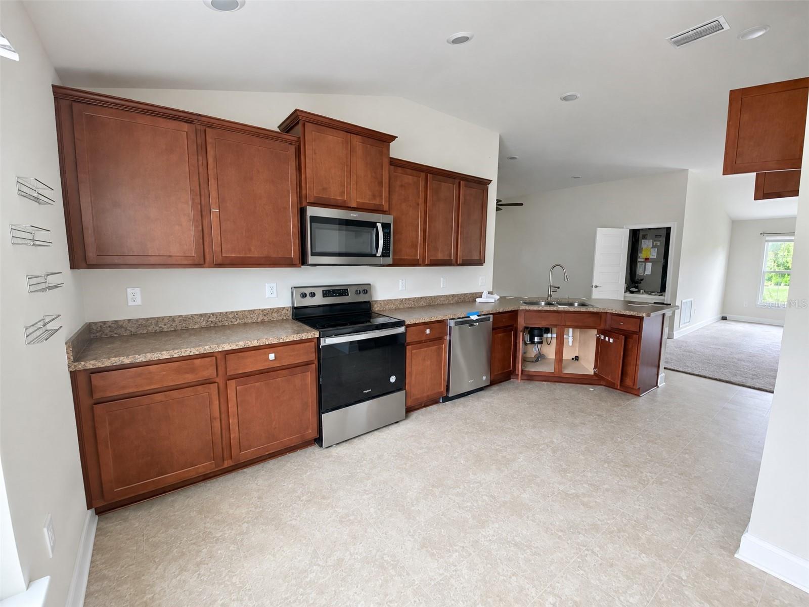 View of Kitchen Cabinets and Peninsula.