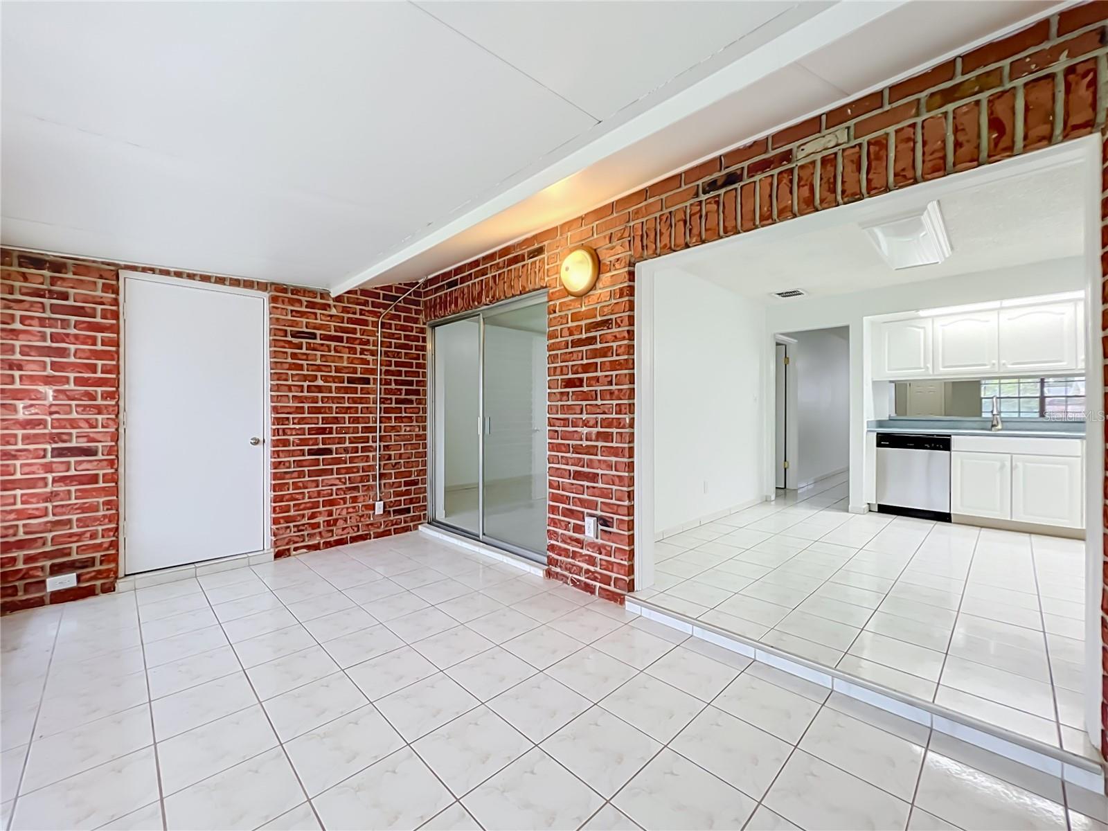 Flexible bonus space with convenient access to the kitchen and main living areas.