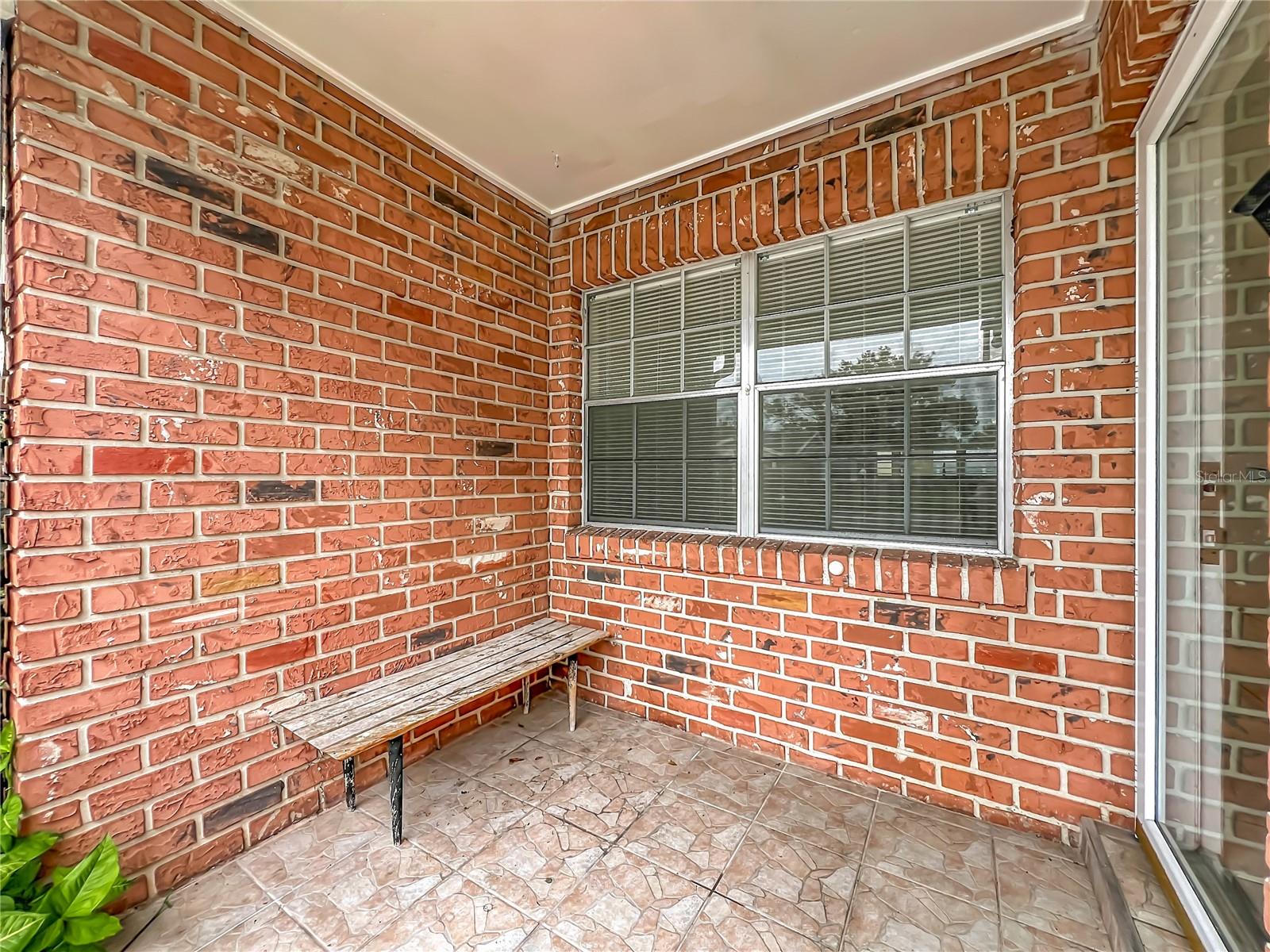 Private covered front entry welcomes you home.