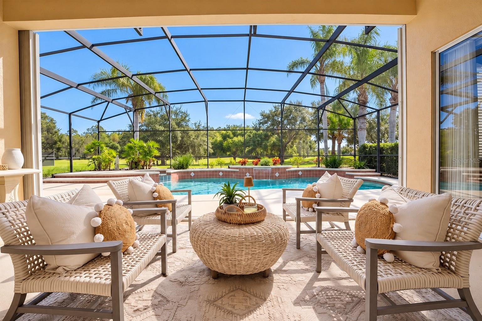 STUNNING SCREEN-ENCLOSED POOL AND EXPANSIVE OUTDOOR LIVING AREA! Enjoy breathtaking views of lush tropical landscaping and peaceful green space with NO REAR NEIGHBORS! The spacious covered lanai overlooks the sparkling pool, creating the perfect setting for morning coffee, entertaining guests, or relaxing while enjoying Florida's beautiful year-round weather. YOUR OWN PRIVATE BACKYARD PARADISE!
