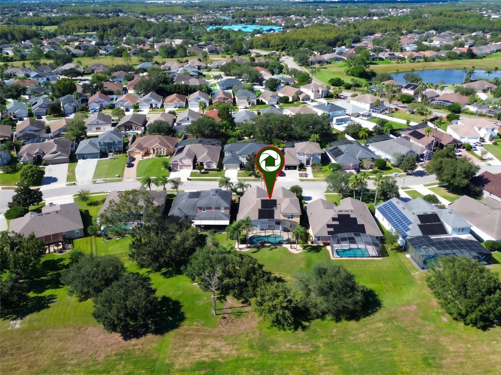 BEAUTIFUL AERIAL VIEW OF THIS STUNNING POOL HOME NESTLED ON A QUIET CUL-DE-SAC IN THE HIGHLY DESIRABLE GATED COMMUNITY OF EASTWOOD!