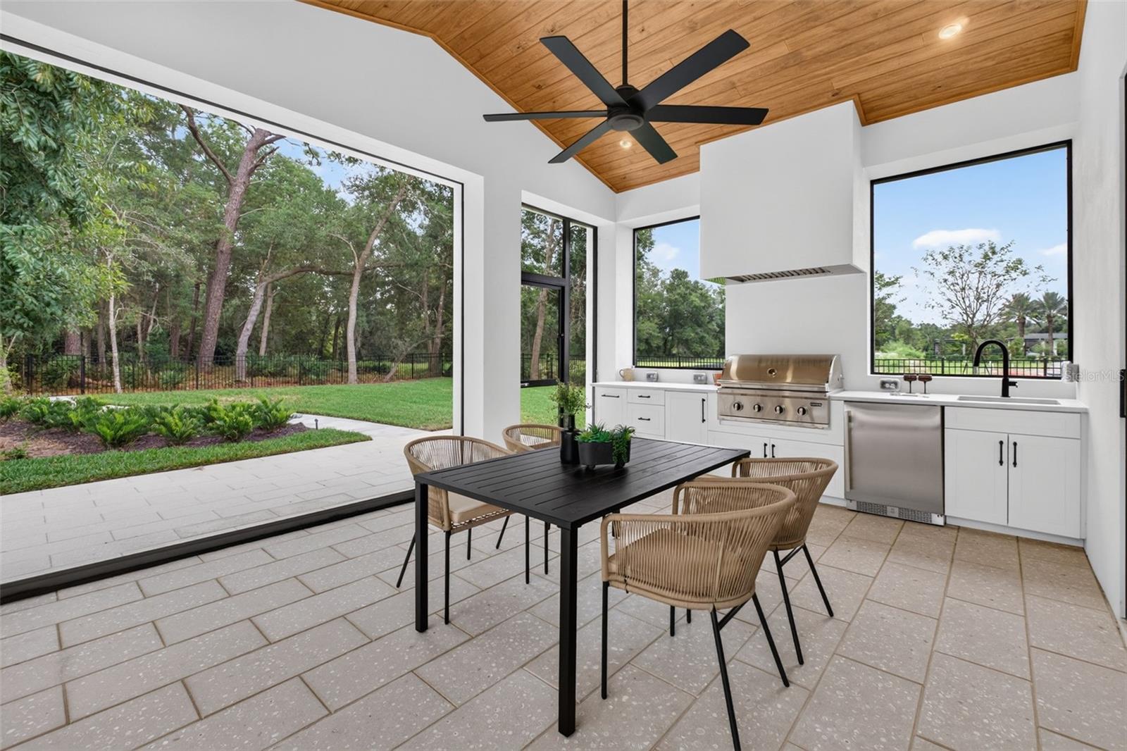 Covered lanai with motorized retractable screens