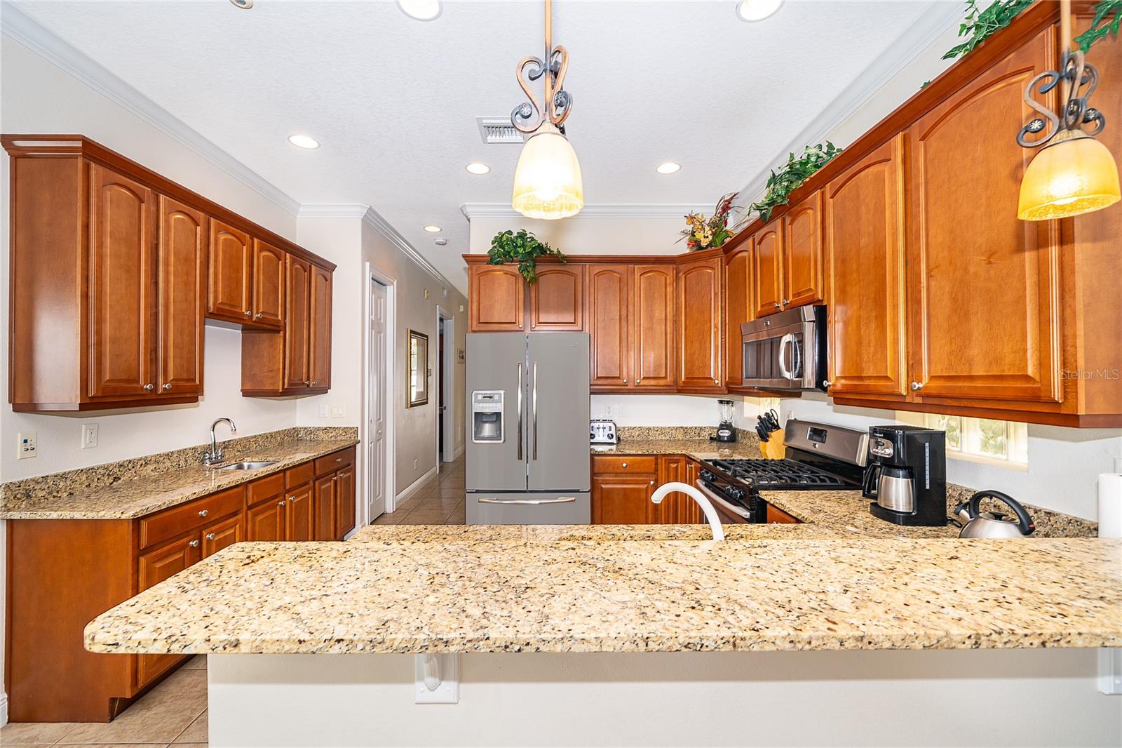 Kitchen offers wet bar Kitchen offers wet bar