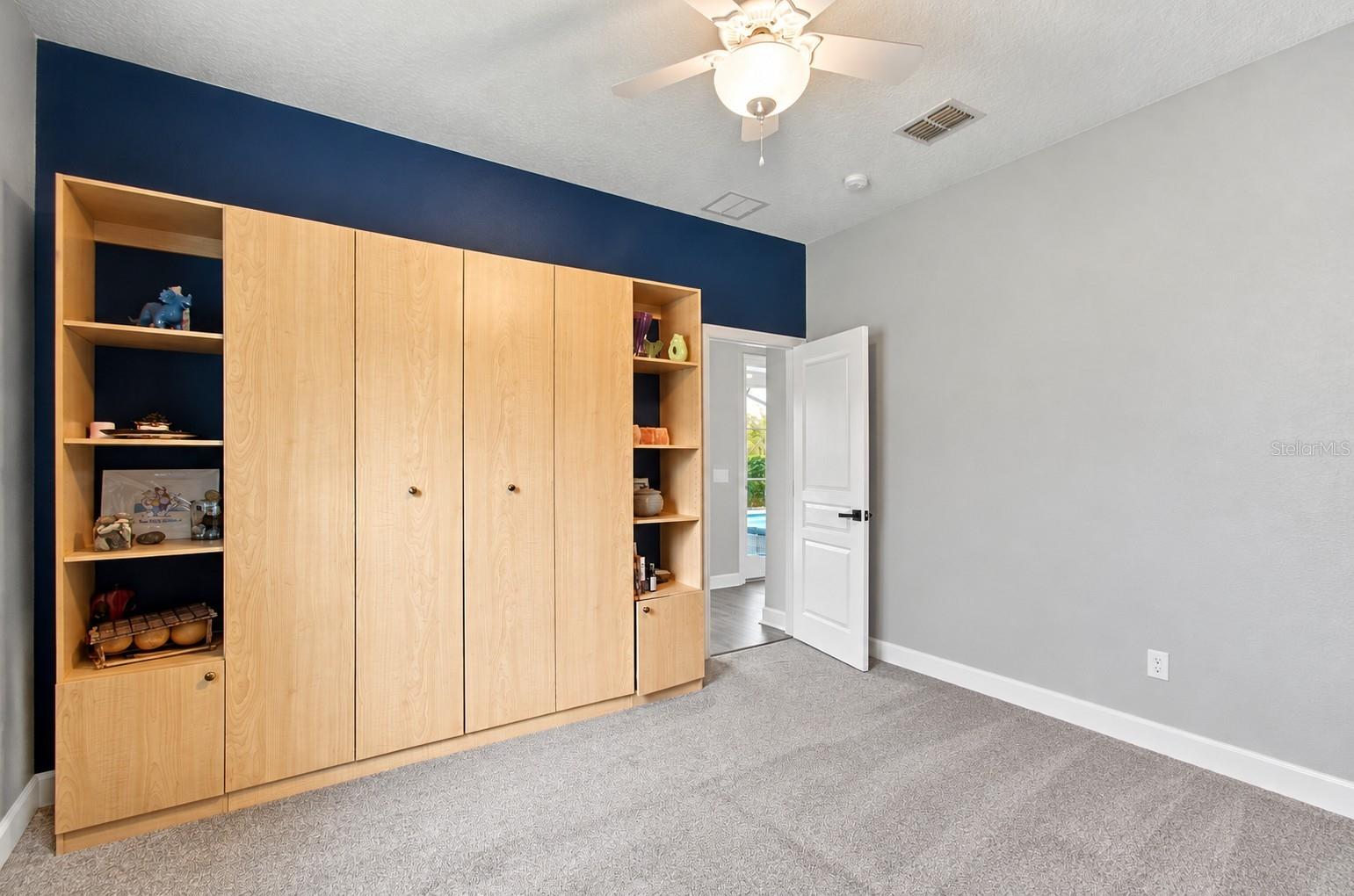 Furniture virtually Bedroom 5 downstairs Murphy bed is built in