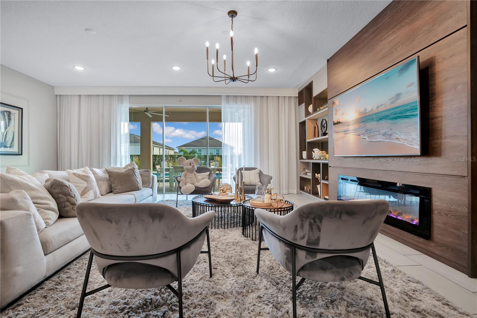 Thoughtful architectural detailing elevates this beautifully designed great room